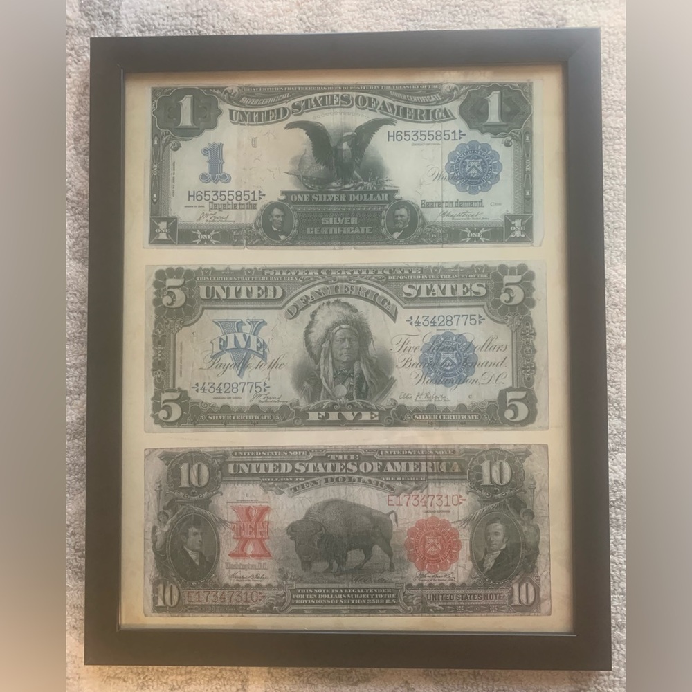 Framed image of the legendary $1, $5 and $10 silver certificates of 1899.